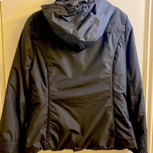Calvin Klein puffy coat with gold accents and many pockets & hood!